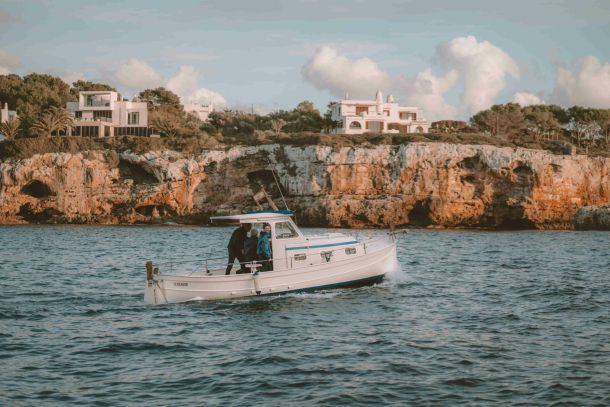 boat at sea porto colom copy scaled 40ccf541